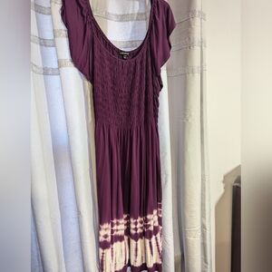 Comfortable Cool Purple Dress With The Detail Around Bottom.
